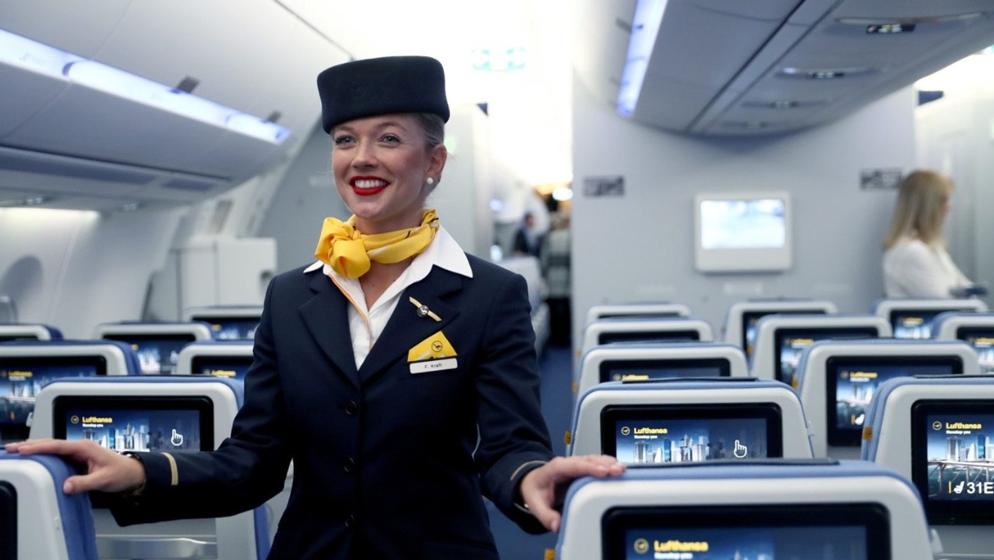 Why Do Flight Attendants Wear Scarves? Style and Functionality Together